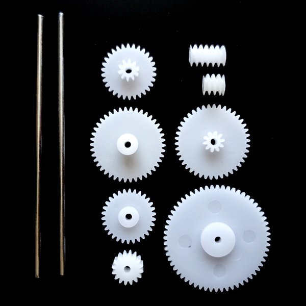 Set Of 10 Small White Plastic Gears Worms and Shafts